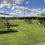 Outdoor seating at The Larch Barn cafe in Cleobury Mortimer