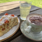 Cherry Bakewell slice, cappuccino and fizzy mint drink at The Larch Barn in Cleobury Mortimer