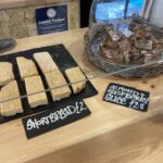 Tray-bake selection at the Island Street Deli in Salcombe, Devon