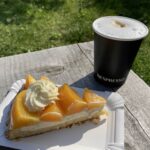 Peach slice and cappuccino at Manuela's Wee Bakery in Ardelve