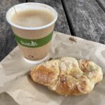 Almond croissant and latte at the Espresso Farm in Tanworth-in-Arden, Warwickshire