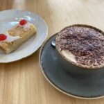 Bakewell blondie and cappuccino at McCowans cafe in Aberaeron, Ceredigion