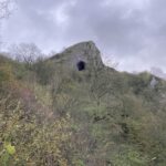 View of Thor's Cave in the Peak District National Park along the Manifold cycleway
