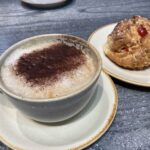 Cappuccino and cherry scone at Wheatcroft's Wharf Cafe in Cromford