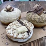 Kinder Bueno and caramel digestive doughnut and Milkybar cookie sandwich at The Steamhouse Bakery in Redditch