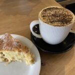 Cappuccino and gooseberry & coconut cake at Kin Kitchen in Ludlow, Shropshire