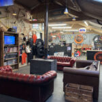 Wood burner and Chesterfield sofas at SpokeCycles CC near Welwyn