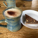 Cappuccino and salted caramel shortbread slice at Black Gold cafe in Bishops Cleeve