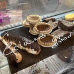 Chocolate eclair and pastries at The Deli in Belbroughton, Worcestershire