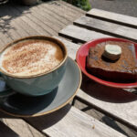Cappuccino and warm chocolate & banana loaf at The Green Wood Cafe in Ironbridge