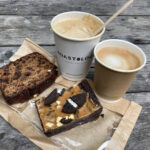 Caramel Oreo brownie, fruit cake and cappuccino at the Penny Pot Cafe in Edale, Peak District