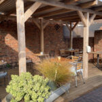 Outdoor seating at Maisie's Courtyard Cafe in Tewkesbury