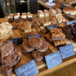 Cake, tray-bake and cookie selection at Coffiology cafe in Caerleon