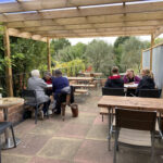 Outdoor seating and terrace at the Kitchen cafe in Wyre Piddle