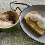Cappuccino and eggs on toast at Megs Hotspur Cafe at Shobdon Airfield
