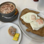 Poached eggs on toast with cappuccino & Welsh cake at Y Gegin Fach cafe in Machynlleth