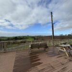 Outdoor seating and views from Daynes Farm Shop in Devon near Totnes
