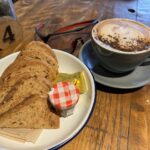 Cappuccino and toast at the Malt House cafe at Harvington Hall near Kidderminster