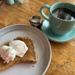 Poached eggs & Americano at Number 85 Coffee in Cheltenham